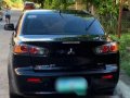 Selling Black Mitsubishi Lancer Ex 2012 Manual Gasoline at 80000 km -1