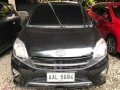 Selling Black Toyota Wigo 2014 in Quezon City-9