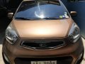 Selling Hatchback Brown 2014 Kia Picanto Automatic -0