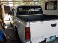 White Nissan Frontier 2010 at 70000 km for sale in Quezon City-2
