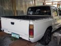 White Nissan Frontier 2010 at 70000 km for sale in Quezon City-4