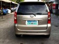 Selling Gold Toyota Avanza 2009 at 89,882 km in Cainta-5