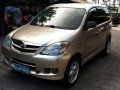 Selling Gold Toyota Avanza 2009 at 89,882 km in Cainta-7