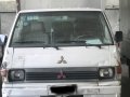 Selling White Mitsubishi L300 2010 Van in Mandaue -0