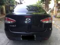 Black Mazda 2 2010 Sedan at 134000 km for sale-4