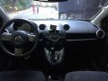 Black Mazda 2 2010 Sedan at 134000 km for sale-1