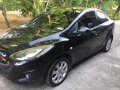 Black Mazda 2 2010 Sedan at 134000 km for sale-0