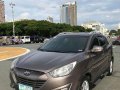 Selling Brown Hyundai Tucson 2011 Automatic Gasoline at 83000 km in Quezon City-9