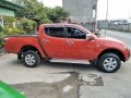 Selling Red Mitsubishi Strada 2014 at 49000 km in Quezon City-7