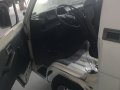 Selling White Mitsubishi L300 2010 Van in Mandaue -5