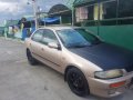 Selling 1997 Mazda 2 Sedan for sale in Lipa-0