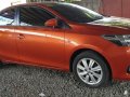 Orange Toyota Vios 2015 at 10000 km for sale in Quezon City-0