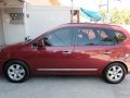 Red Kia Carens for sale in Mandaue-10