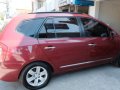 Red Kia Carens for sale in Mandaue-3