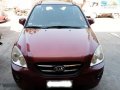 Red Kia Carens for sale in Mandaue-11