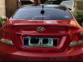 Red Hyundai Accent 2013 Sedan for sale in Quezon City -1
