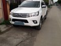 Selling White Toyota Hilux 2018 Manual Diesel in Bulacan-1