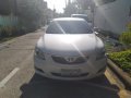 Selling Pearl White Toyota Camry 2007 at 60000 km in Caloocan-8