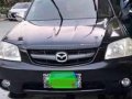 Selling Like New Mazda Tribute 2005 in Kawit-8