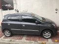 Gray Toyota Wigo 2015 Hatchback Manual Gasoline for sale in Quezon City-6