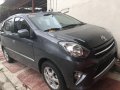Gray Toyota Wigo 2015 Hatchback Manual Gasoline for sale in Quezon City-7
