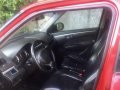 Selling Red Suzuki Swift 2012 Automatic Gasoline in San Mateo-1