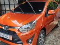 Selling Orange Toyota Wigo 2019 Manual Gasoline in Quezon City-0