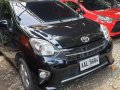 Black Toyota Wigo 2014 Automatic Gasoline for sale in Quezon City-1