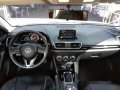 White Mazda 3 2015 at 15000 km for sale-4