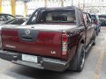 Red Nissan Frontier 2009 Automatic Diesel for sale-3