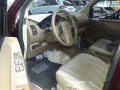 Red Nissan Frontier 2009 Automatic Diesel for sale-1