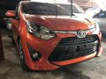 Orange Toyota Wigo 2017 for sale in Quezon City-1