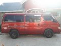 Red Nissan Urvan 2010 for sale in Pagsanjan-4