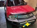 Red Mitsubishi Strada 2012 Automatic Diesel for sale -1