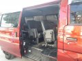 Red Nissan Urvan 2010 for sale in Pagsanjan-3