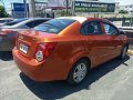 Orange Chevrolet Sonic 2015 at 30303 km for sale -1