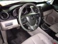 Red Mazda Cx-7 2011 at 63276 km for sale-5