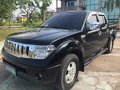 Selling Black Nissan Navara 2009 Manual Diesel -5