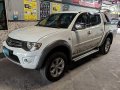 Sell White 2013 Mitsubishi Strada Manual Diesel at 57500 km -0