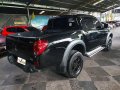 Black Mitsubishi Strada 2011 at 71000 km for sale -3