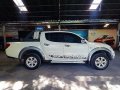 Selling White Mitsubishi Strada 2013 Manual Diesel at 51000 km -2