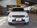 Selling White Mitsubishi Strada 2013 Manual Diesel at 51000 km -0
