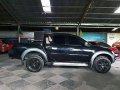 Black Mitsubishi Strada 2011 at 71000 km for sale -2