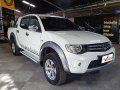 Selling White Mitsubishi Strada 2013 Manual Diesel at 51000 km -1