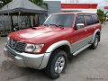 Selling Red Nissan Patrol 2001 at 141000 km -2