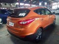 Orange Hyundai Tucson 2015 for sale in Quezon City-6