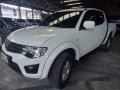 Selling White Mitsubishi Strada 2014 Automatic Diesel -5