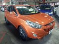 Orange Hyundai Tucson 2015 for sale in Quezon City-9