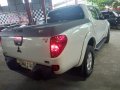 Selling White Mitsubishi Strada 2014 Automatic Diesel -2