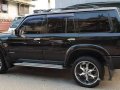 Selling Black Nissan Patrol 2002 in Malolos-3